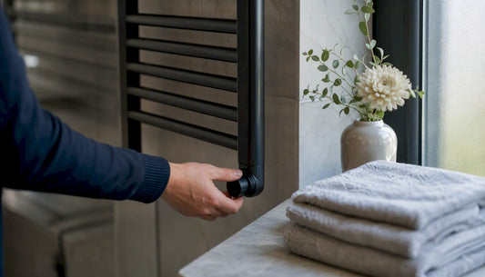 Hand adjusting heated towel rail thermostat