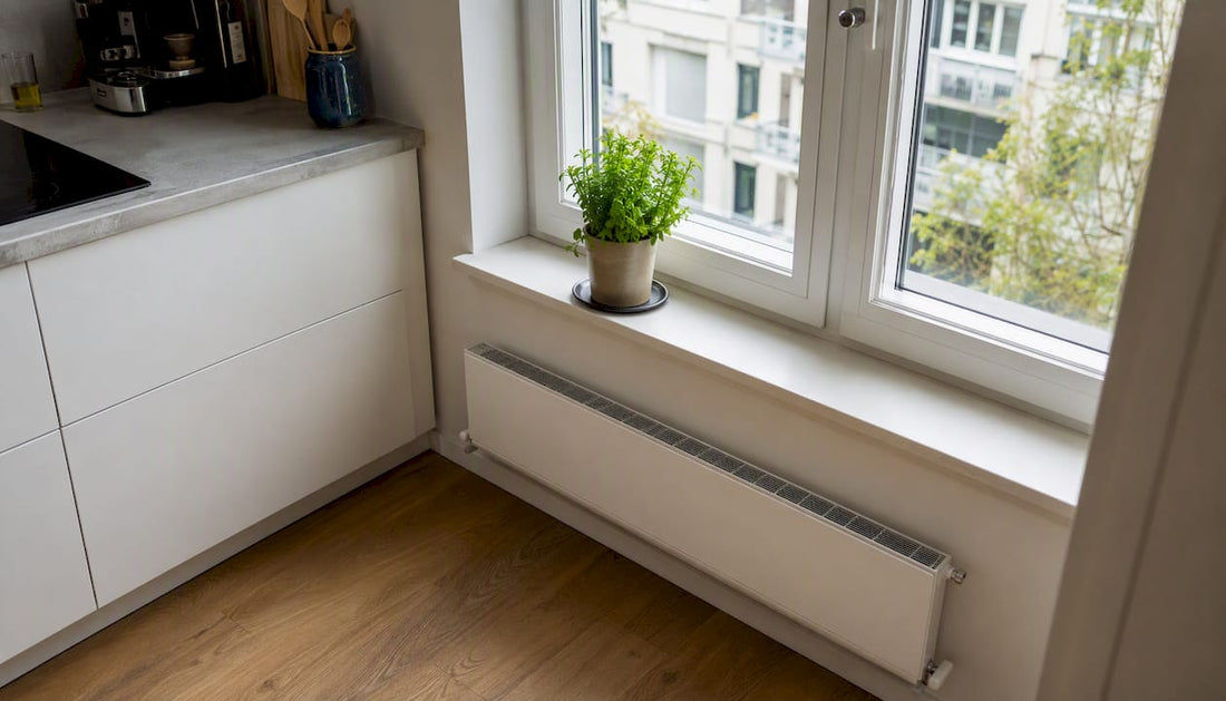 Low profile radiator under windowsill