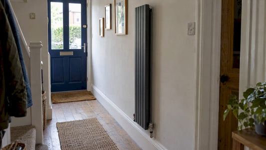 Slim radiator in a narrow UK hallway