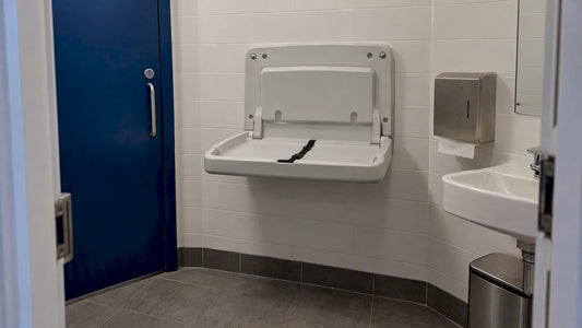 Open baby changing table in family washroom